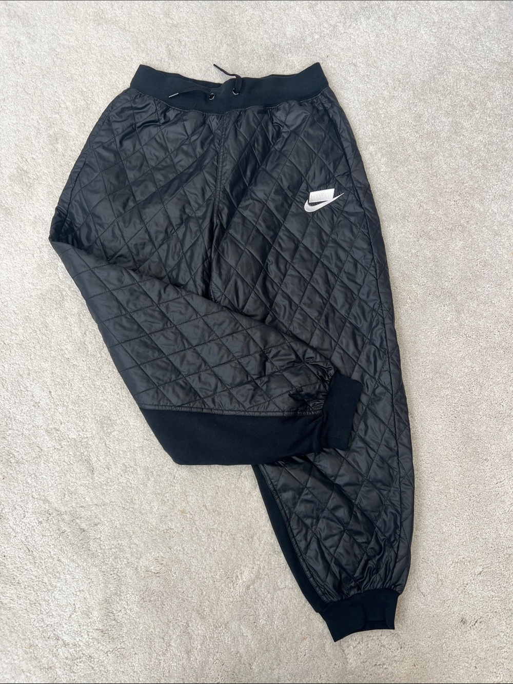 Nike Black Quilted Kids Jogger Pants with White Swoosh